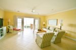 Comfortable Seating Surrounds the Large Flat Screen Television and Paned Glass Doors  Florida Keys Vacation Rental